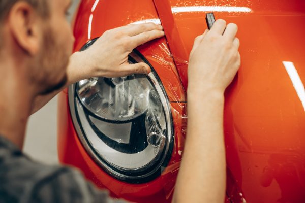 Car wrapping with foil at car service